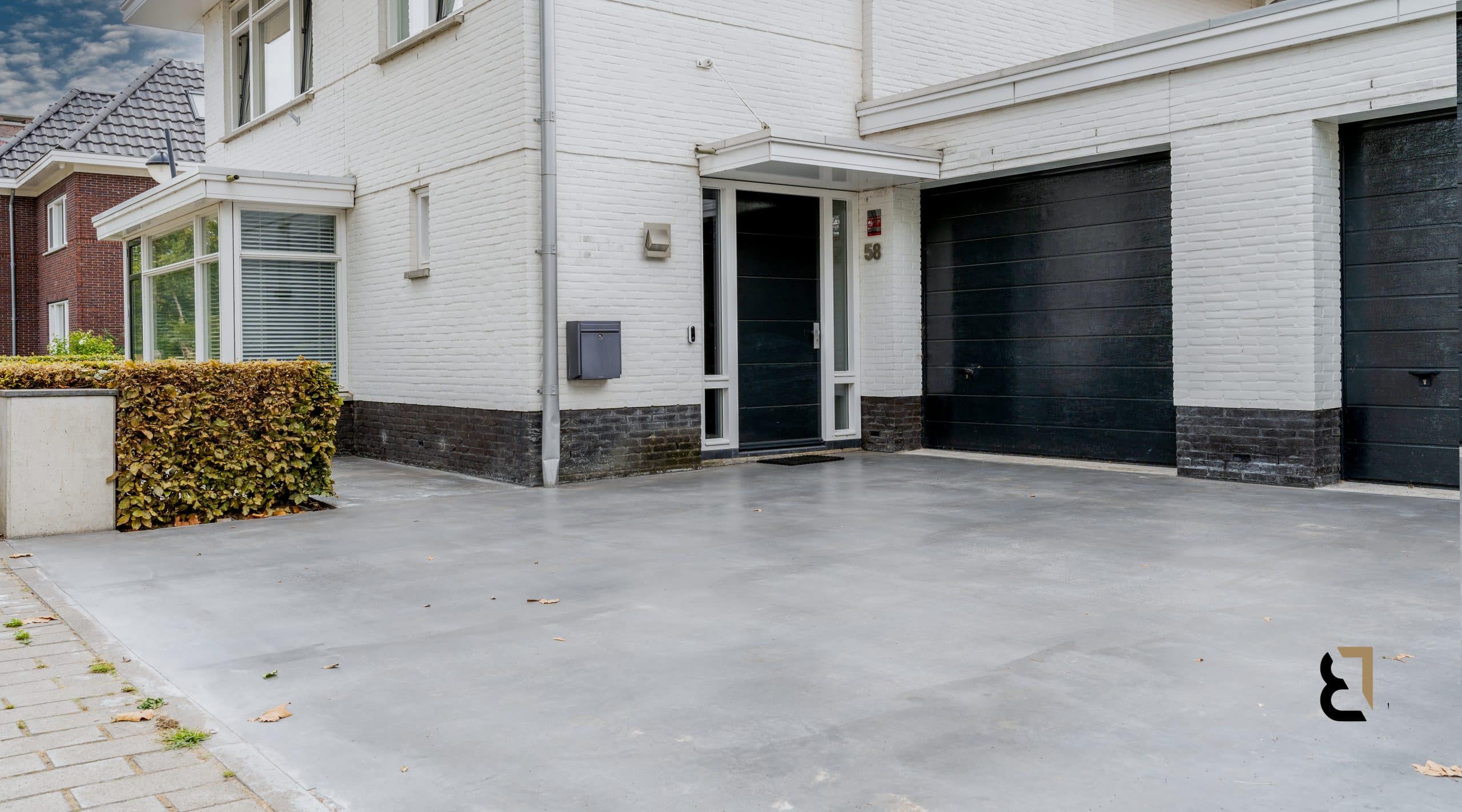 Realisatie van een betonnen oprit bij een woning
